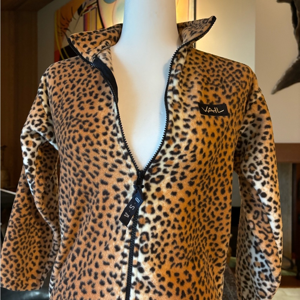 Leopard Print Plush Fleece Coat.  This is a child’s fleece zip up. About size 8